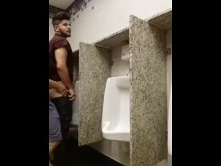 Cruising for sex and breeding a slut at a urinal while being watched
