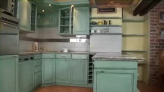 Une mature suce la bite du plombier